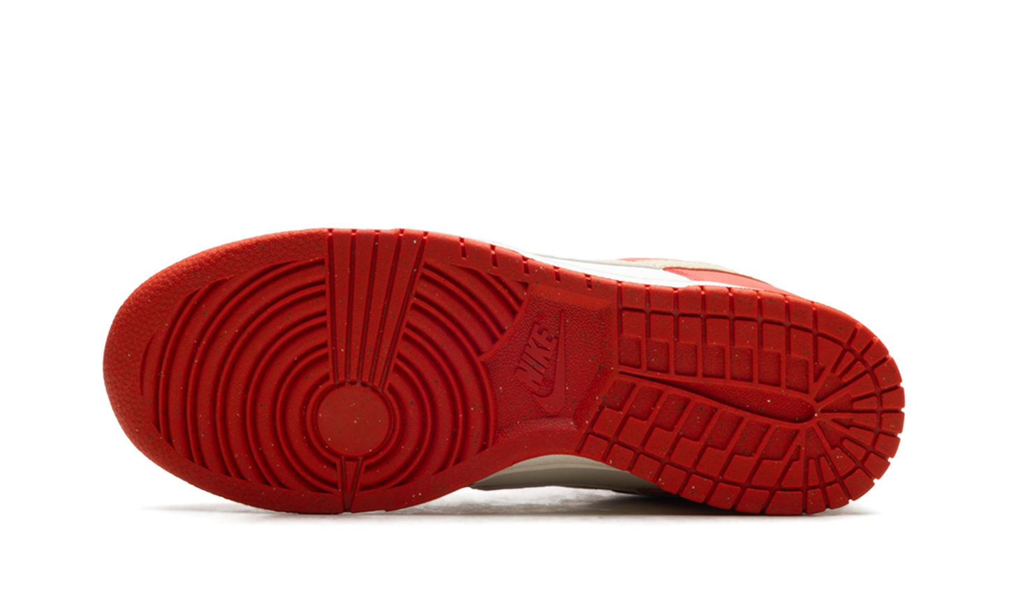 Dunk Low Next Nature WMNS Light Crimson Team Gold